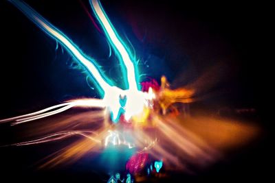 Blurred motion of ferris wheel