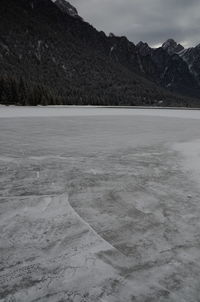 Scenic view of frozen lake against mountain