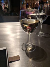 Close-up of wine glass on table in restaurant