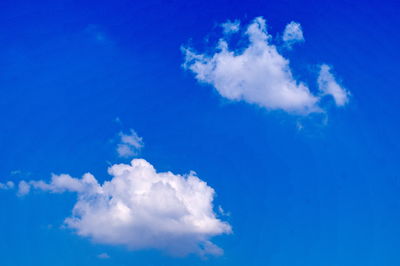 Low angle view of clouds in blue sky