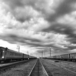 View of road against cloudy sky