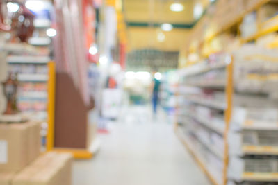 Blurred motion of books on shelf at store