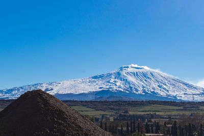 View of volcano etna from a small sicilian village