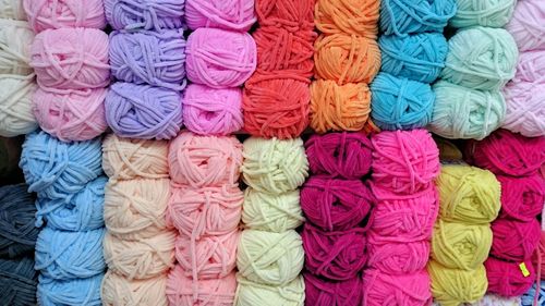 Full frame shot of colorful woolen balls at store