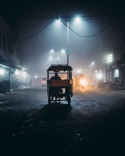 Illuminated street at night