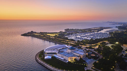 High angle view of city at sunset