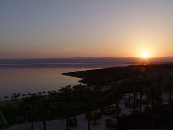 Scenic view of sea against sky at sunset