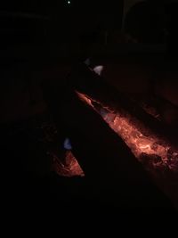 High angle view of man relaxing on fire