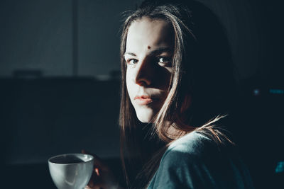 Portrait of woman with drink