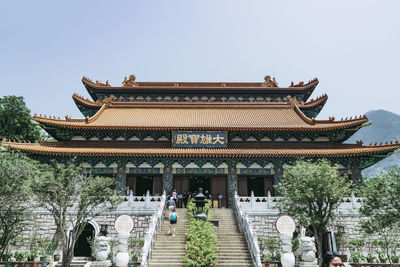 Low angle view of temple against building