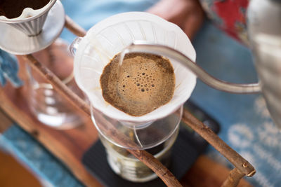 High angle view of coffee cup on table