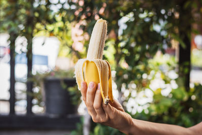 Close-up of hand holding ice cream cone