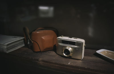 Close-up of camera on table