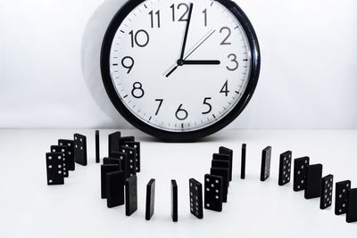 Close-up of clock on table