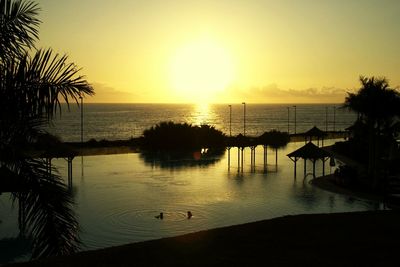 Scenic view of sea at sunset