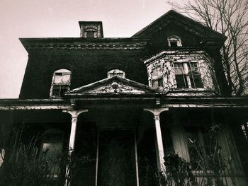 Low angle view of bridge against sky at night