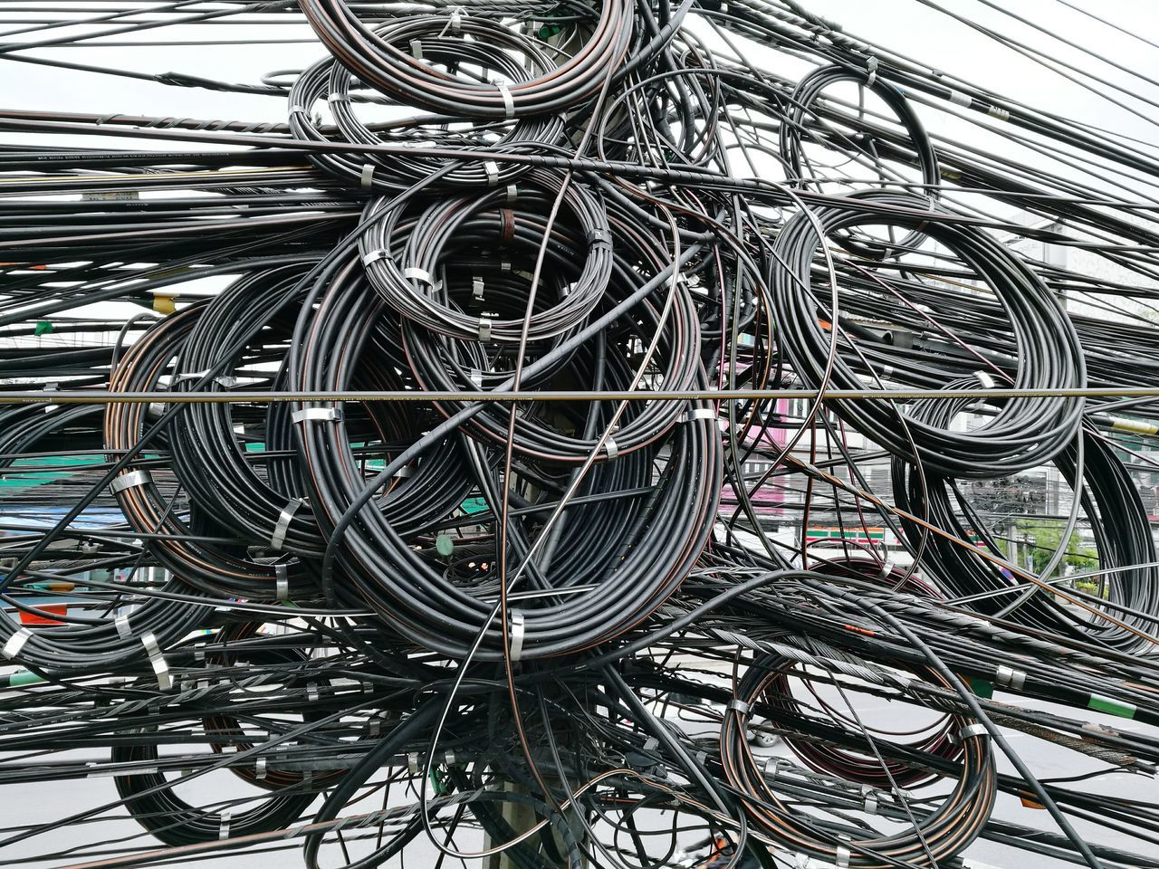 FULL FRAME SHOT OF CABLES AGAINST CEILING