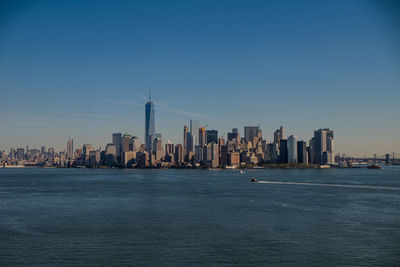 View of modern buildings against clear sky