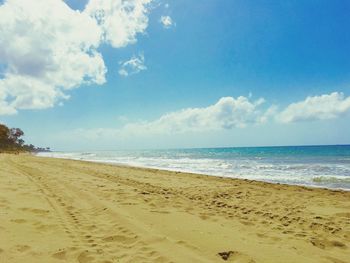 Scenic view of beach against sky