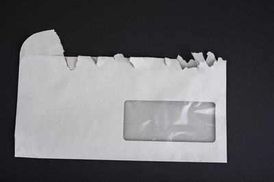Close-up of paper against black background