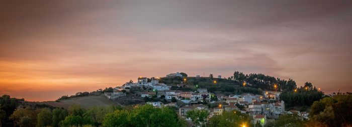 Panoramic shot of cityscape against sky