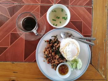 Popular thai dish, stir fried pork basil wth fried egg, spicy thai food