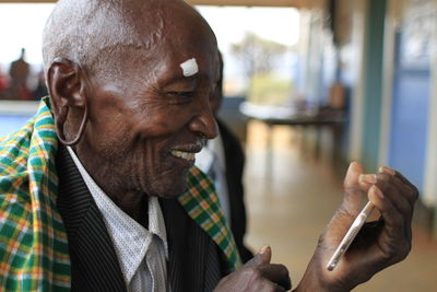 Close-up portrait of man smiling