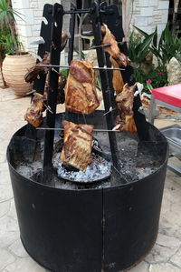 High angle view of meat on barbecue grill