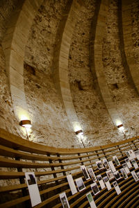 Low angle view of illuminated ceiling