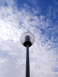 Low angle view of street light against sky