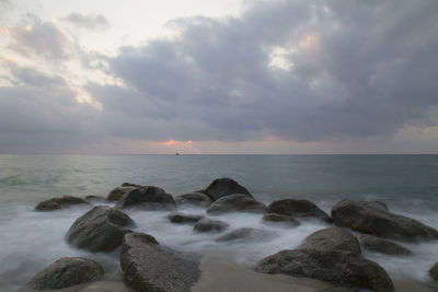 Scenic view of sea against sky during sunset