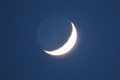 Low angle view of moon in sky