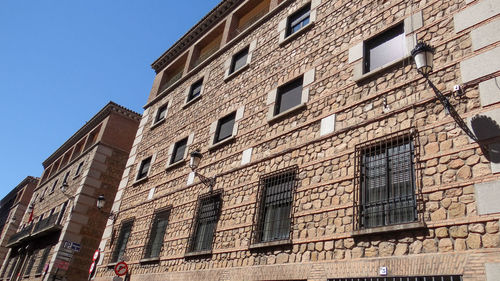 Low angle view of old building against sky