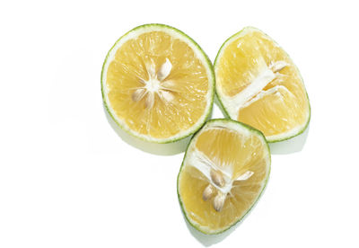 Close-up of fruits against white background