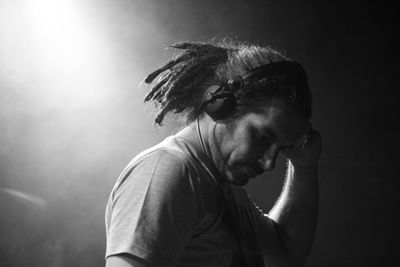 Portrait of young man looking away