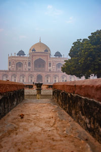 Humayun tomb exterior view at misty morning from unique perspective