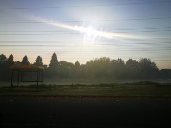 Scenic view of field against clear sky