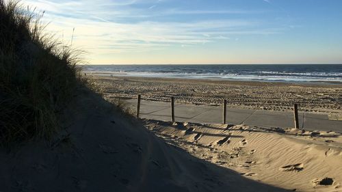 Scenic view of beach against sky