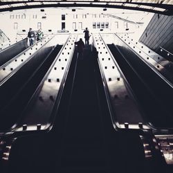 People standing on escalator