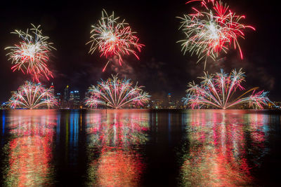 Firework display at night