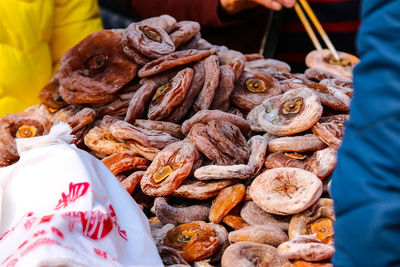 Dried persimmon at market for sale