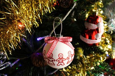 Close-up of illuminated christmas tree at night