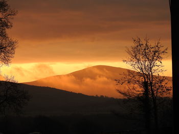 Scenic view of dramatic sky during sunset