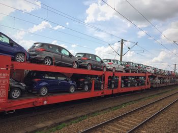 Train on railroad tracks against sky