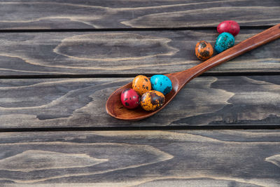 High angle view of easter eggs with spatula on table