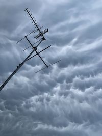 Low angle view of airplane flying in sky