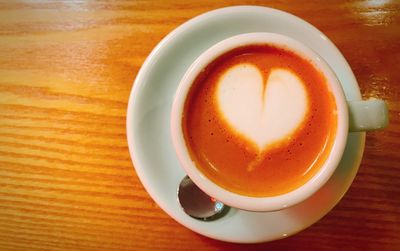 Close-up of coffee served on table