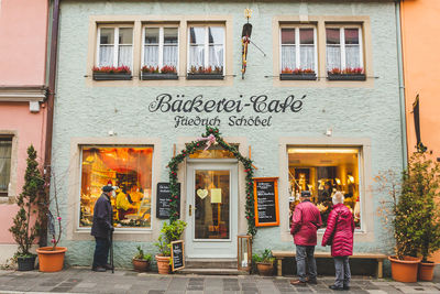 Group of people in front of building