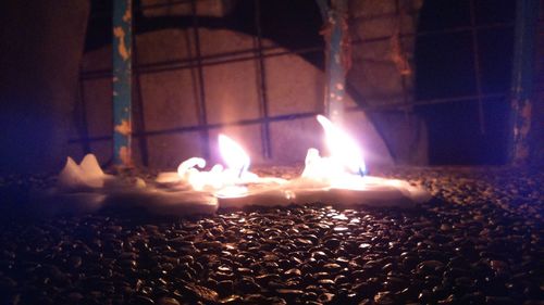 Close-up of burning candles