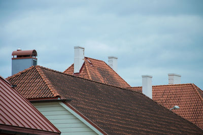 Roof of house against sky